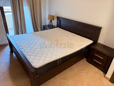 Wooden bed king size with bedside drawers