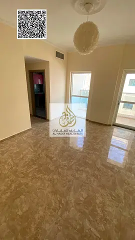 Two-bedroom apartment with a living room for annual rent in Al Rashidiya 3, behind Grand Mall, Ajman.