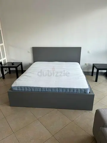 MALM
Bed frame, high, grey stained/Luröy, 180x200 cm