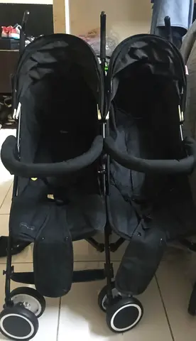 Double side-by-side stroller in good used condition