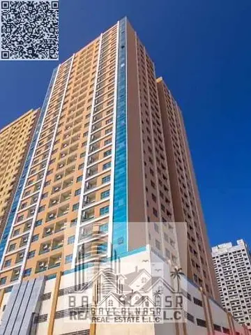 Elegant 4-Bedroom Apartment with Balcony & 1 Covered Reserved Parking Spaces for Sale in Paradise Lake Towers, Ajman