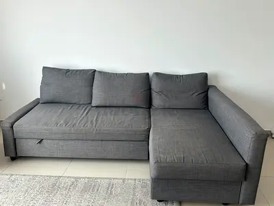 Grey L-shaped Sofa Bed with Storage — Good Condition