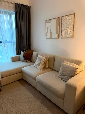 Light beige L-shaped sofa from Home Centre