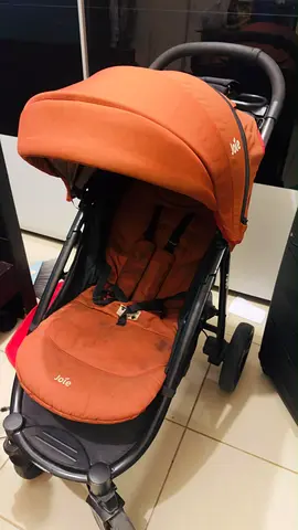 Joie orange stroller