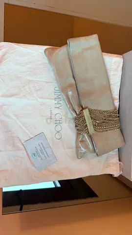 Jimmy Choo Chandra Metallic Leather Chain Clutch in champagne gold, with the original Jimmy Choo box