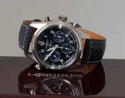 Longines Spirit Chrono(COSC) BLUE DIAL & Rado Captain Cook BRONZE AED 9800(Longines) AED 8900 (Rado)