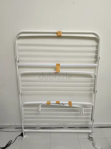 Foldable White Clothes Drying Rack on Wheels - Good Condition