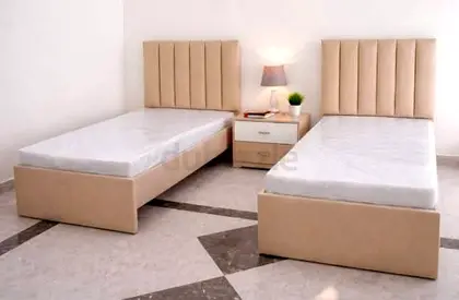 Pair of Beige Single Beds with Headboards