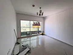 2BR in Al Khan with balcony, parking, maid’s room, 4 baths, open view, swimming pool, gym & footba