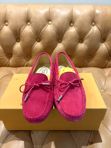 Tod’s ladies’ Gommino suede driving loafers in bright pink, with bow detailing and metallic lace 39