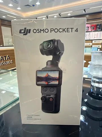 DJI Osmo Pocket 4 handheld gimbal camera - like new, boxed