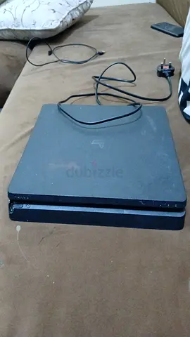 Used Sony PlayStation 4 Slim with power cable - good working condition it have two games spiderman.
