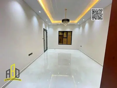 Villa for rent in a prime location, featuring a rooftop terrace, built-in wardrobes, and a shaded p