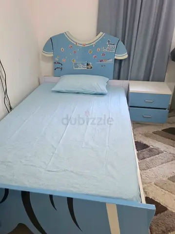 Single kids bed with matching bedside table - light blue, good condition