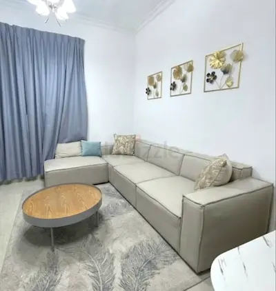 L-shaped beige sectional sofa - modern, good condition