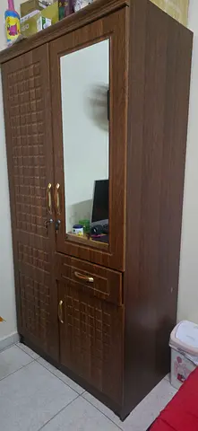 Two-door wooden wardrobe with mirror - good condition