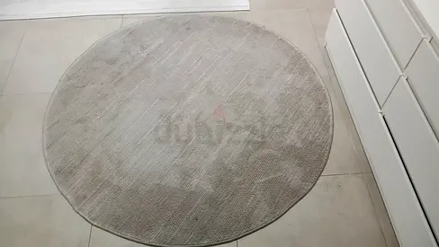 Round beige area rug - gently used, 1.5m diameter