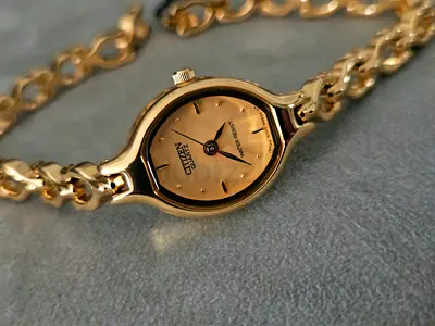 Gold-tone Citizen ladies bracelet watch - working, elegant small face