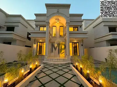 A luxury villa for sale in a highly strategic, prime location, featuring a private swimming pool and high-end finishes. The price includes registratio
