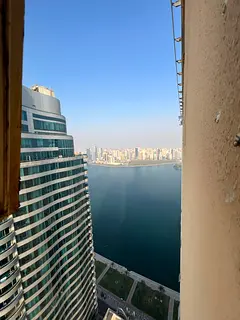 Three-bedroom apartment in Al Majaz 3, Sharjah. Four bathrooms, free AC and parking, maid’s room a