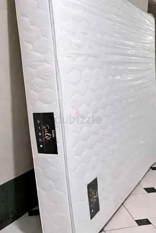 Queen Size Mattress - New, Still Wrapped
