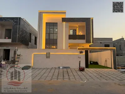 Villa for sale in Al Helio, Ajman. Features 4 master bedrooms, a majlis, 2 living areas, and a maid