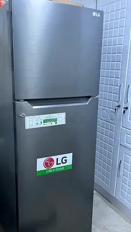 LG Stainless Steel Top Freezer Refrigerator - Good Condition