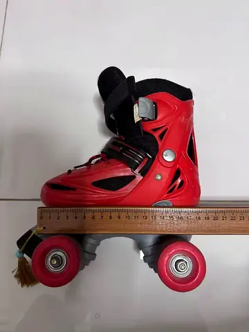 Used Red Quad Roller Skates for Kids