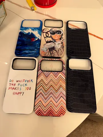 6 phone cases — mixed designs, good condition, only one used, for iPhone 17 pro max and 18 pro max