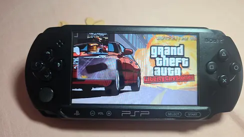 Sony PSP 2000 handheld console with GTA: Liberty City Stories