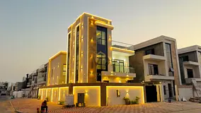 Luxury corner villa for sale in Ajman | Two floors + roof | Private pool | Unique design and high-en