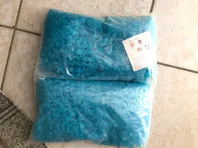 Brand new blue luminous beads (2 sealed bags) -  crafting/depilatory beads glow in the dark