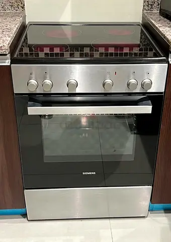 Siemens new latest model ceramic electric stove top 4 hobs 60by60cm size excellent working good cond