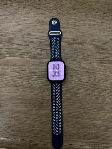 Used smartwatch with silicone sports band - good working condition