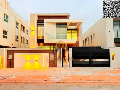 Luxury villa for sale in Al Muwaihat, spanning 5,000 square feet. Located in an exceptional area close to all amenities. Includes water, electricity,