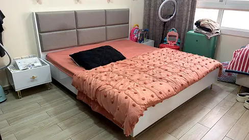 Master Bed and White 6-Drawer Dresser with Mirror and Gold Handles