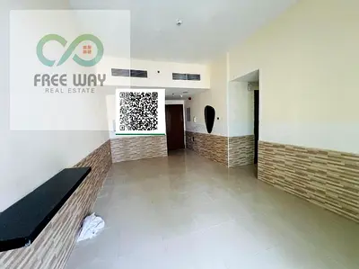Two-bedroom apartment with a living room for annual rent at Al Aroua Towers