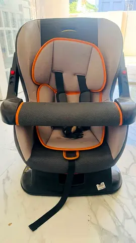 Used Infant/Toddler Car Seat in Grey with Orange Trim - Good Condition