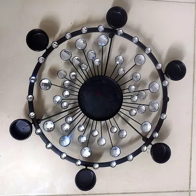 Decorative metal candle holder centerpiece — 8-arm with mirror accents