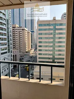 For rent in Al Majaz 3: an apartment with three bedrooms, three bathrooms, and a living room, featur