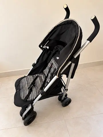 Lightweight black umbrella stroller in good used condition