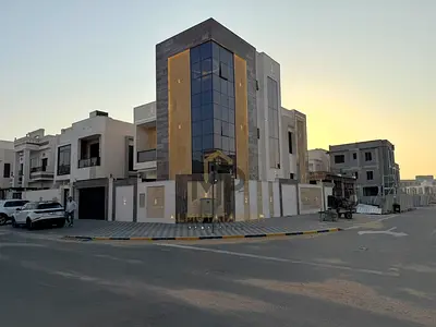 فيلا زاوية جديدة كلياً للبيع في العامرة – عجمان، 5 غرف نوم ماستر، تصميم راقٍ ومساحات واسعة، مثالية للسكن العائلي والاستثمار.