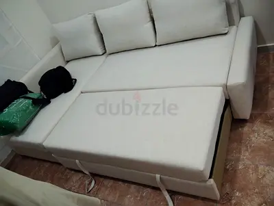 Light beige fabric sofa bed with pull-out mattress - good condition
