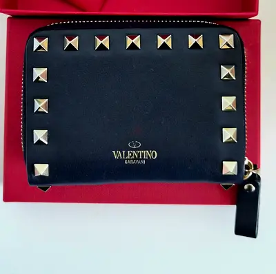 Pre-Loved Authentic Valentino Garavani Dark Blue Leather.