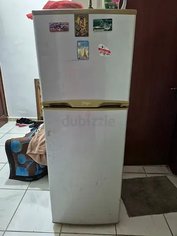 Used single-door refrigerator - compact fridge in working condition
