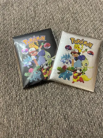 Two Pokémon collectible card sleeves - Pikachu & starters design