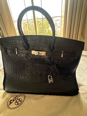 Black leather bag - preowned -never worn