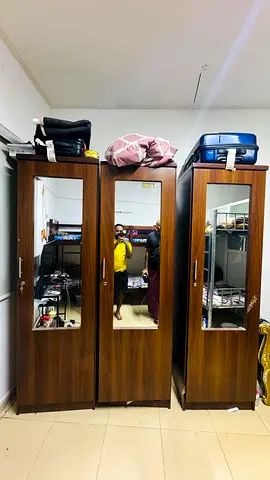 Three-door wooden wardrobe with mirrors — good condition