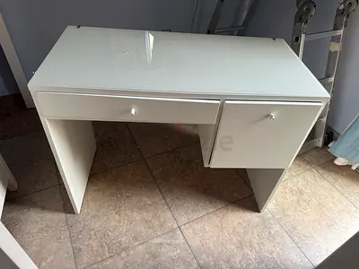White small study/computer table with drawer and cabinet. Or dresser with glass top. IKEA