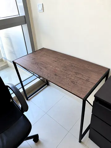 Compact industrial-style study desk with wood top and metal frame